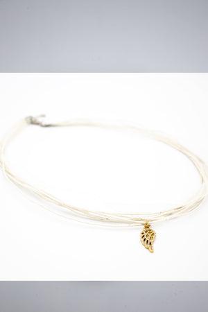 White Ribbon with a Gold Pave Angel Pendant Necklace